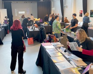 Suzanne Phoenix at table PHOTO: Mike Reed